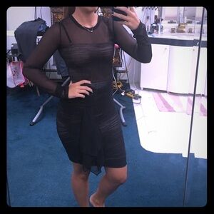 Sexy mesh and ruched BCBG cocktail dress.